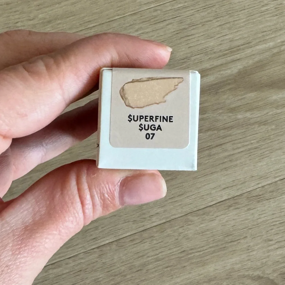 Fenty Beauty Gloss Bomb Oil (full size) and Gloss Bomb Heat (mini)